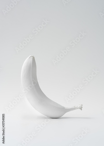 Abstract image of a white banana on a white background. minimalism concept