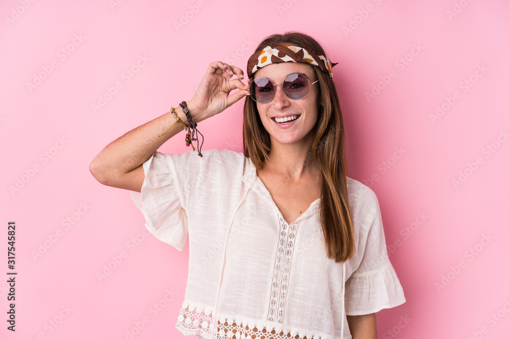 Young hipster caucasian woman isolated excited keeping ok gesture on eye.