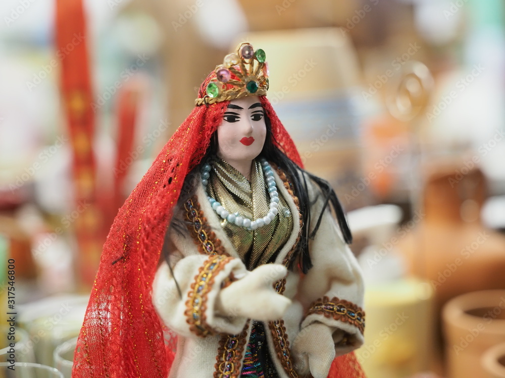 Asian souvenir doll, with typical dress.