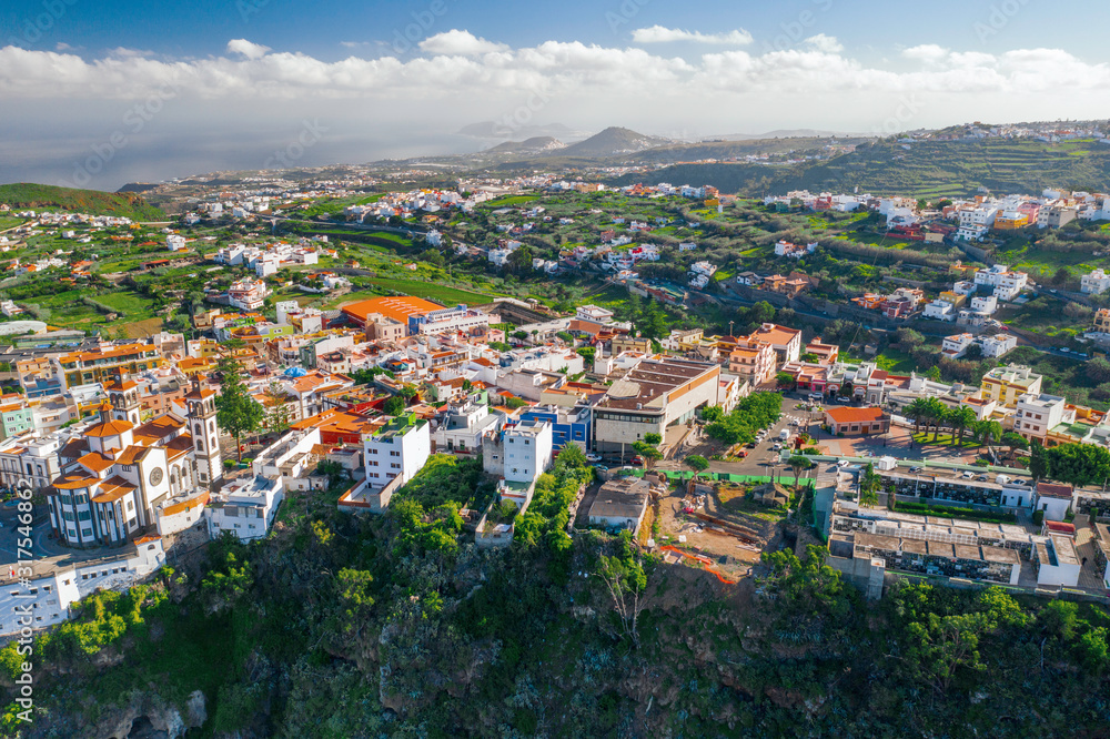 Scenic cinematic aerial view small village Moya on Gran Canaria Gran Canaria on Canary Islands in Spain