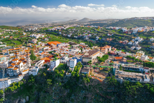 Fototapeta Naklejka Na Ścianę i Meble -  Scenic cinematic aerial view small village Moya on Gran Canaria Gran Canaria on Canary Islands in Spain