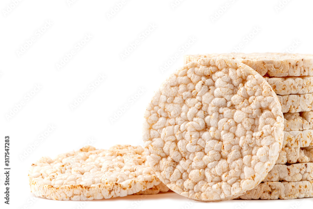 Rice cakes isolated on a white background. Plain rice cakes. Rice cakes isolated on a white background. Plain rice cakes.