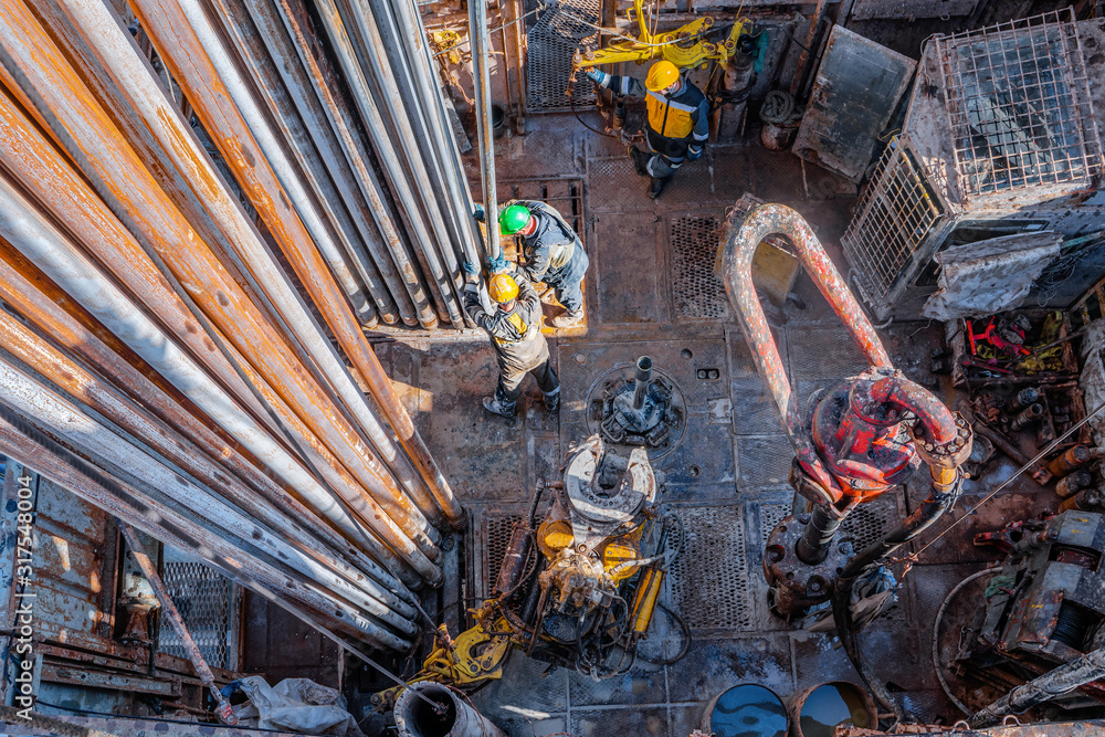 Offshore oil rig worker prepare tool and equipment for perforation oil ...