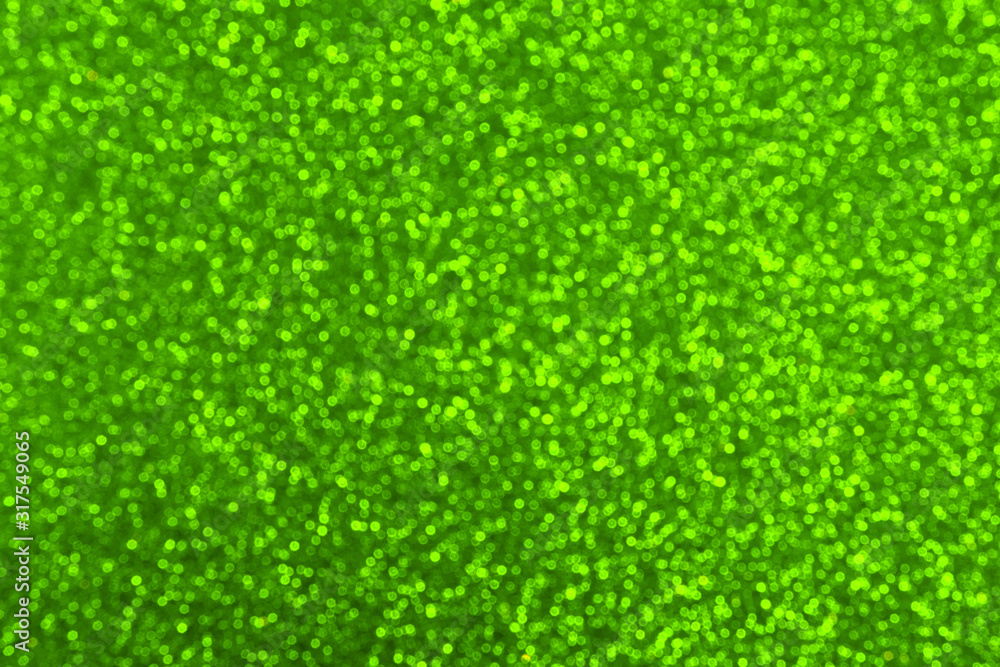 Abstract background with blurred bokeh in green. Abstract background with blurred bokeh in green.