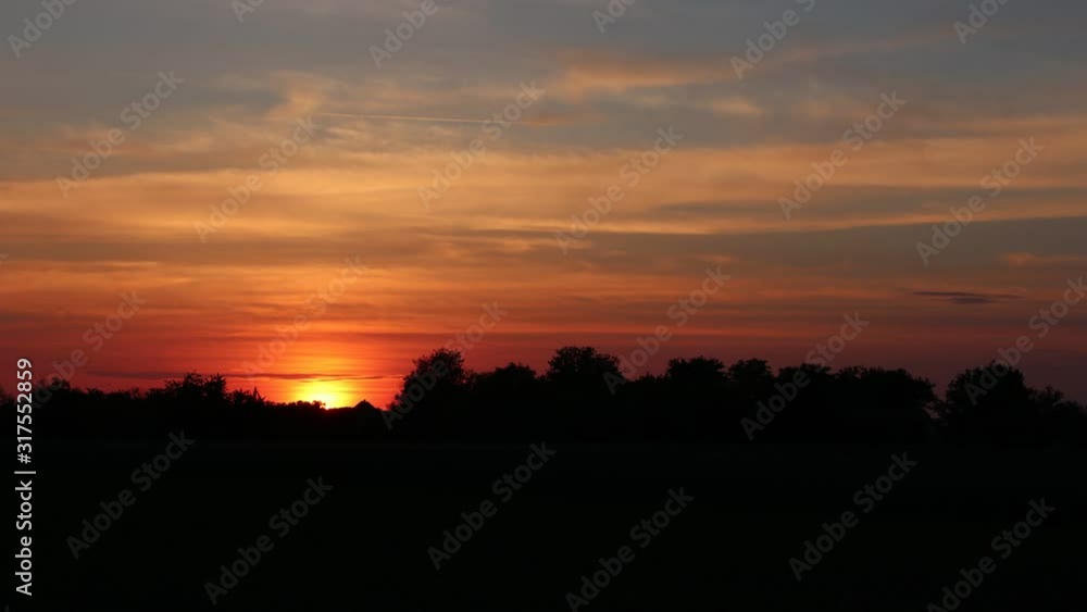 Sunset timelapse with clouds over the forest. Sunset timelapse with clouds over the forest.