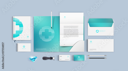 Medical brand template in blue and cyan colors. Corporate identity mockup for clinic or pharmacy. Realistic style for presentation busines and company. Top view vector format. Premium stationery set.
