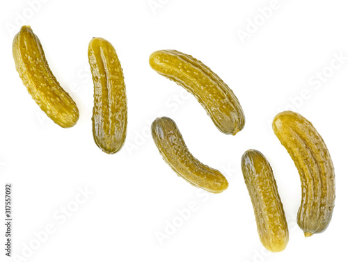 Various сornichons isolated on a white background, top view.
