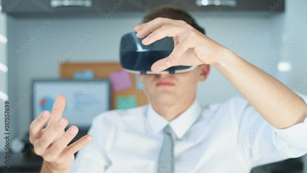 Businessman Using Virtual Reality Headset. Interactive Business Working Concept. Close Up Businessman Using Virtual Reality Headset. Interactive Business Working Concept. Close Up