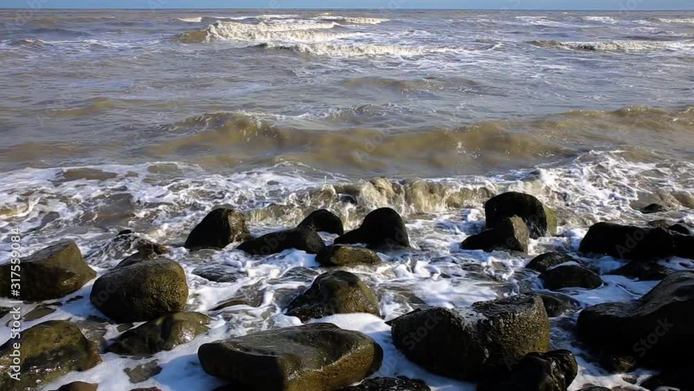 Caspian Sea, Iran, Waves hitting the stone shore Caspian Sea, Iran, Waves hitting the stone shore