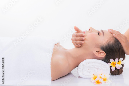 Close up, Beautiful and healthy asian woman in white spa salon. Traditional oriental aroma therapy and beauty treatments isolated on white background.