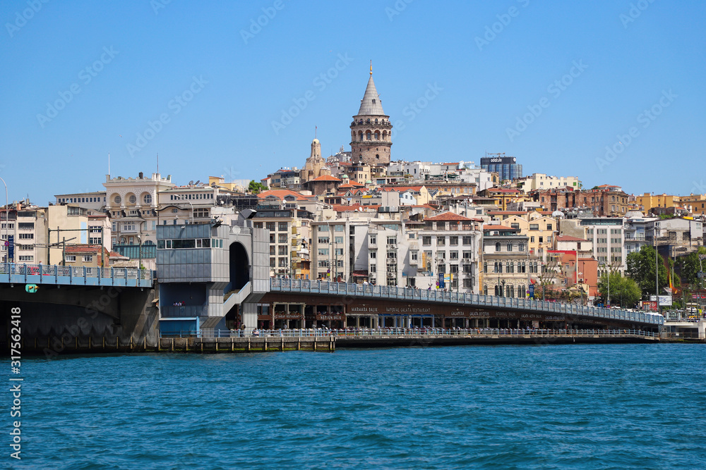 Golden horn Bay, Galata bridge in Istanbul, Galata tower in the background. Turkey, Istanbul, may 2019