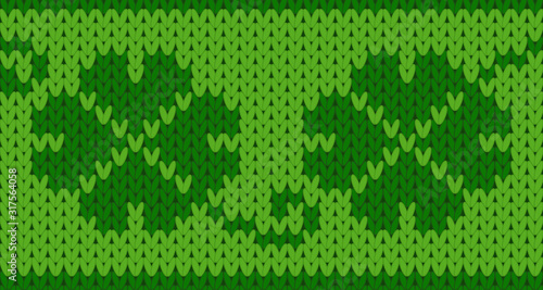 vector knitting seamless background with shamrock pattern