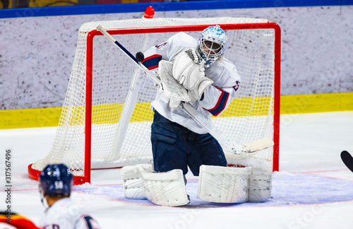 фотографія Ice hockey goalie makes a save