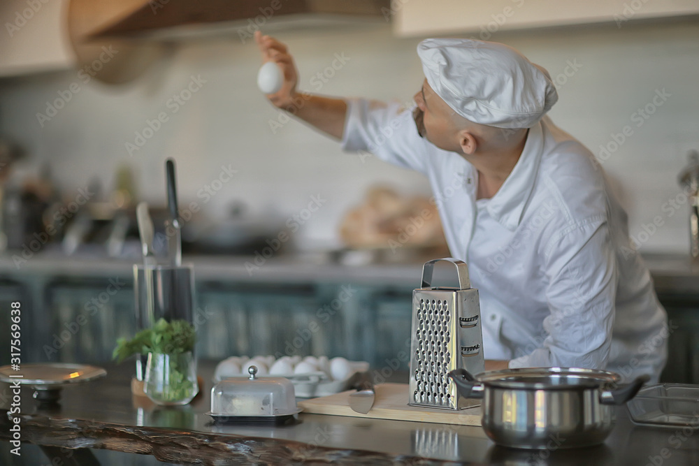 french chef in the kitchen preparing food, cooking, haute cuisine, man with mustache french chef in the kitchen preparing food, cooking, haute cuisine, man with mustache