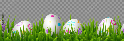 Vector Easter eggs in green grass. Realistic border for Easter holidays. Isolated on transparent background.