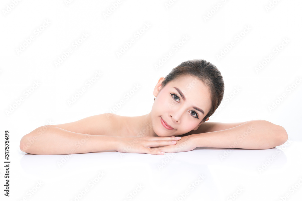 Charming young asian woman with clean fresh skin, Hair sleek, Proposing a product while lying on isolated on white background, Front view, copy space on the top. Charming young asian woman with clean fresh skin, Hair sleek, Proposing a product while lying on isolated on white background, Front view, copy space on the top.