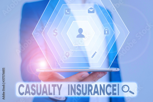 фотографія Writing note showing Casualty Insurance