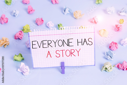 Handwriting text Everyone Has A Story. Conceptual photo Background storytelling telling your memories tales Colored crumpled papers empty reminder blue floor background clothespin