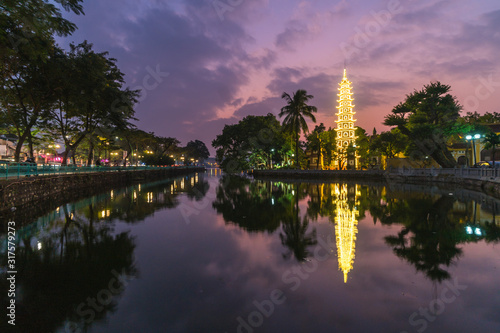 View of Tran Quoc Pagoda in Hanoi in the evening, Vietnam