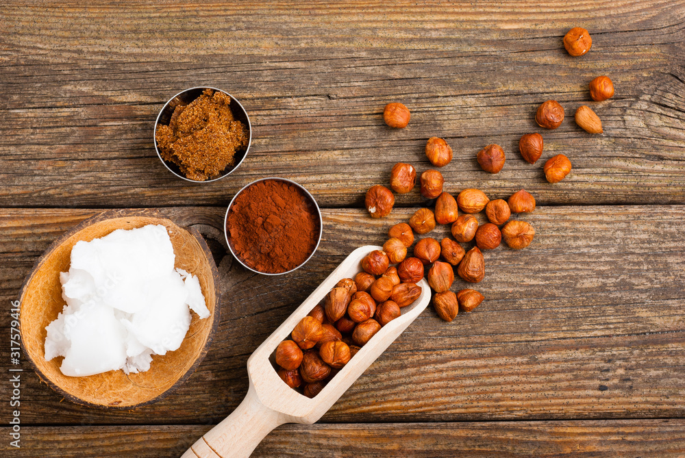 hazelnut cream ingredients on old wooden table hazelnut cream ingredients on old wooden table