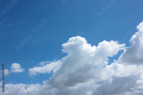 white fluffy cloud and sky