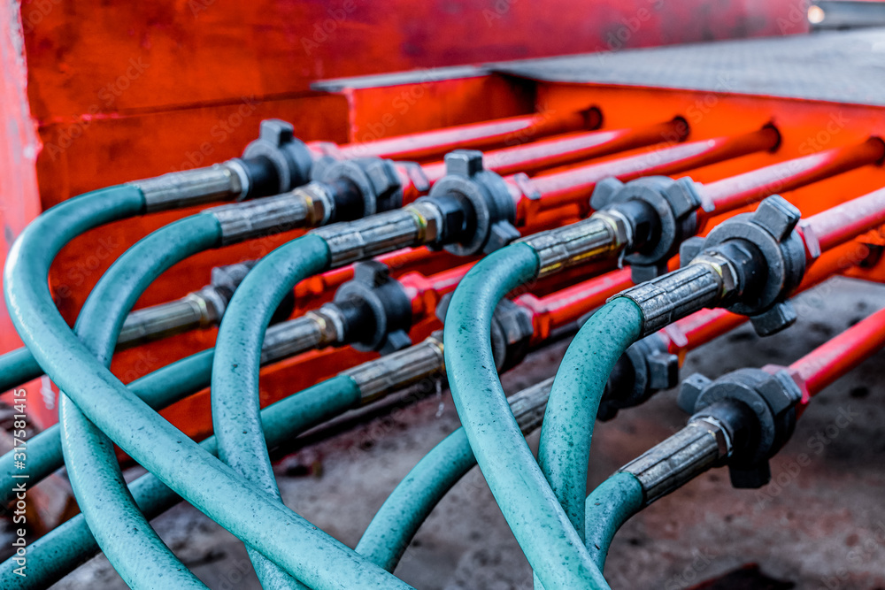 Hydraulic pressure pipes system of construction machinery. Close up