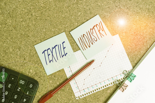Writing note showing Textile Industry. Business concept for production and distribution of yarn cloth and clothing Desk notebook paper office paperboard study supplies chart photo