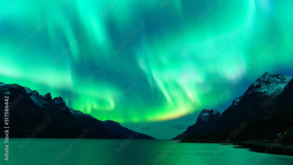 Cinemagraph Of Aura Borealis Lights At Night reflected in the sea