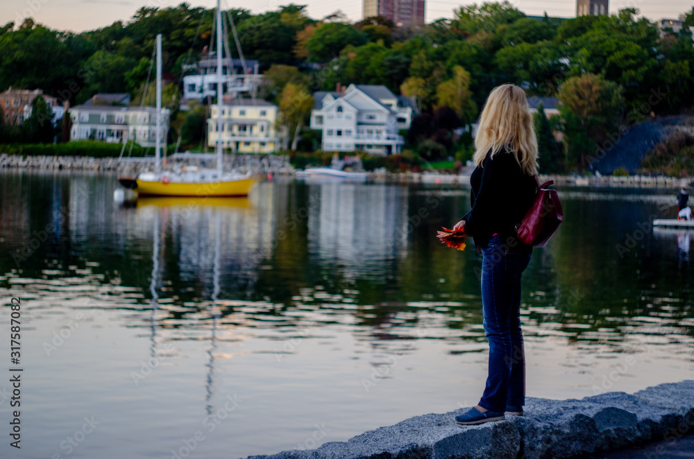 Woman walking around Halifax harbor