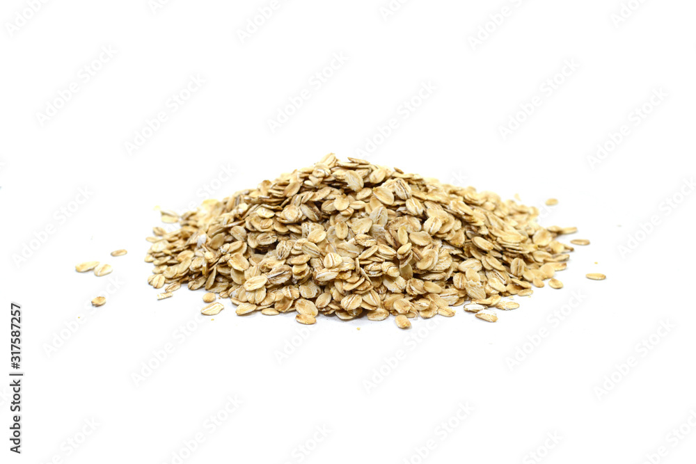 Oat flakes pile isolated on white background.