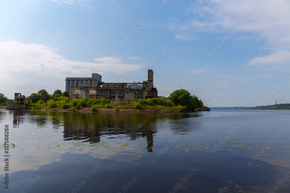 View of the old grain warehouse standing on the Bank of the Volga. Kineshma, Vladimir region, Russia.