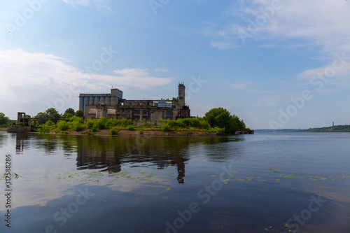 View of the old grain warehouse standing on the Bank of the Volga. Kineshma, Vladimir region, Russia.