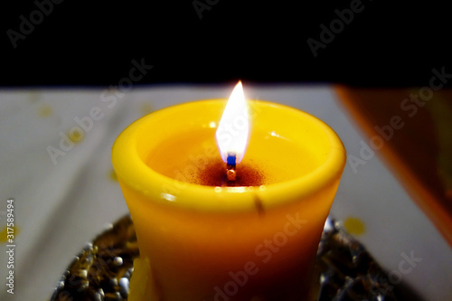 Christmas candle burning on Christmas Eve