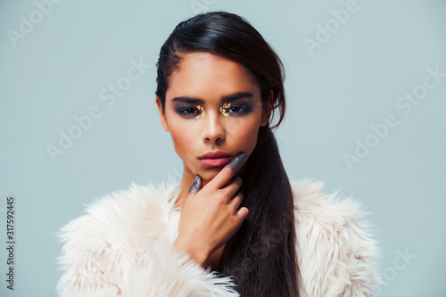 young beauty african american sensual woman with fashion make up, emotional face