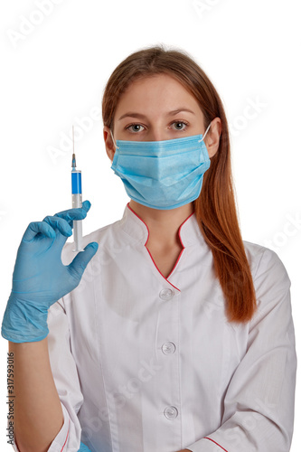 Close-up photo of a female doctor in a white coat. The doctor holds a syringe with medicine in his hands. Doctor in a white coat on a white background.