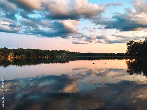 cloudy sunset on lake 