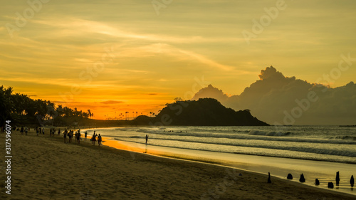 Beautiful fiery sunset on Nacpan beach, Palawan, Philippines