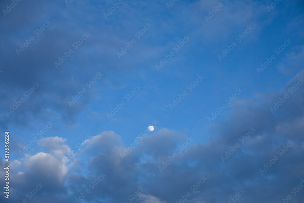Landscape of sky is covered with darkness with beautiful moon shining far away. Landscape of sky is covered with darkness with beautiful moon shining far away.