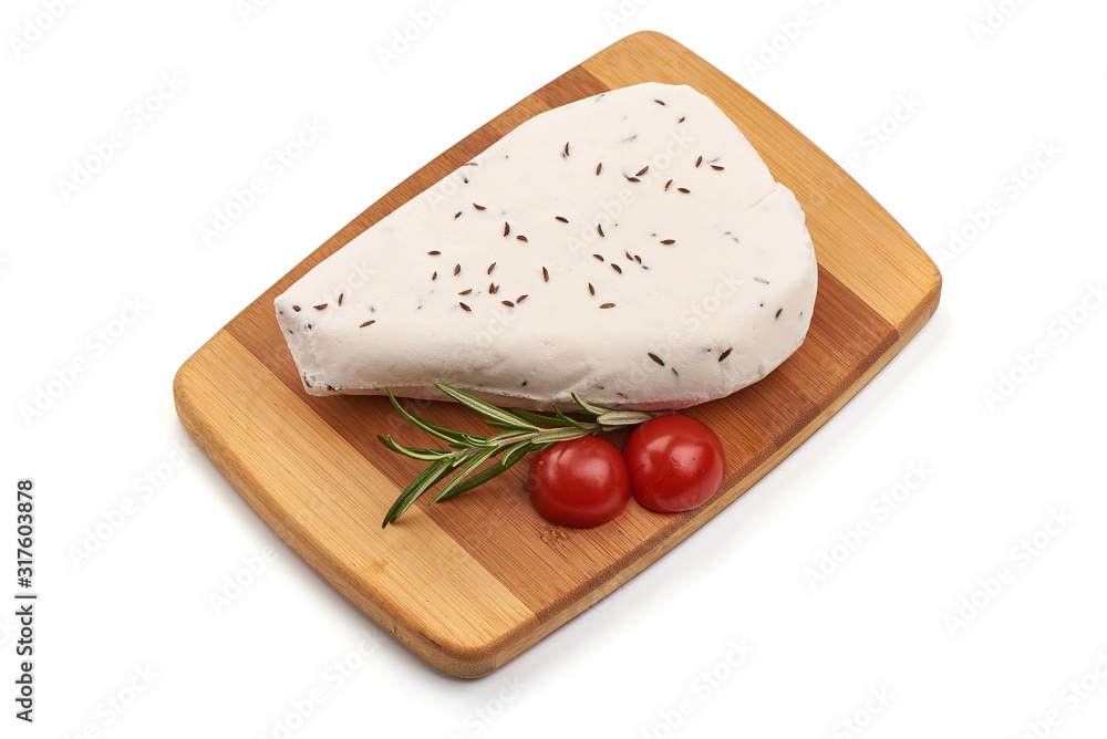 Goat cheese with cumin seeds, isolated on white background Goat cheese with cumin seeds, isolated on white background