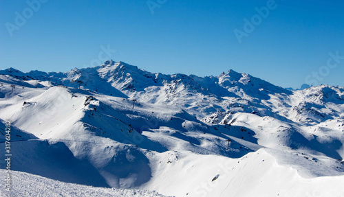 Meribel mottaret val thorens peak view sun snowy mountain landscape France alpes 3 vallees