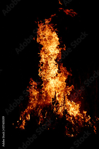 Fire flame texture on the green blurred background