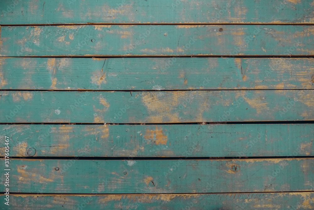 texture of wooden boards of blue color. Old background, shabby boards in blue. texture of wooden boards of blue color. Old background, shabby boards in blue.