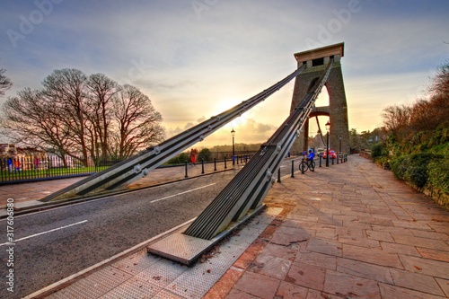 View in a winter sunset of the Clifton Suspension Bridge, a suspension bridge spanning the Avon Gorge and the River Avon in the city of Bristol, UK