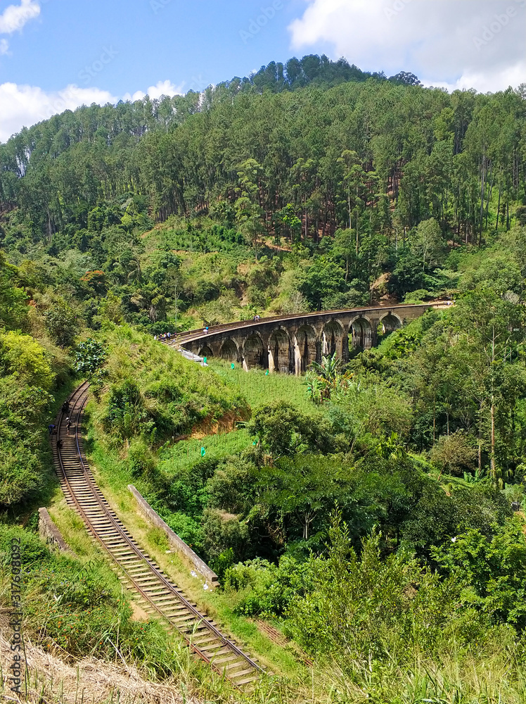 Top view of the railway in the jungle and the famous nine-arch bridge