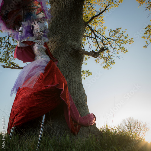 Fairy tale woman on stilts in bright fantasy stylization.