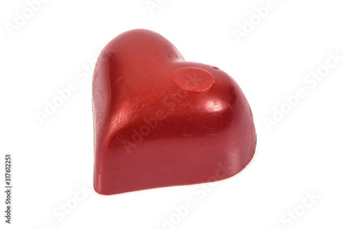 Red heart shaped chocolates on white background