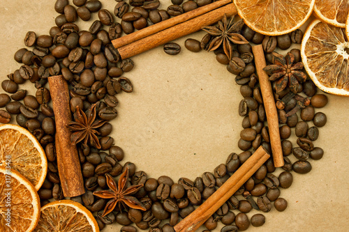 coffee beans and spices lie on the background with place for text