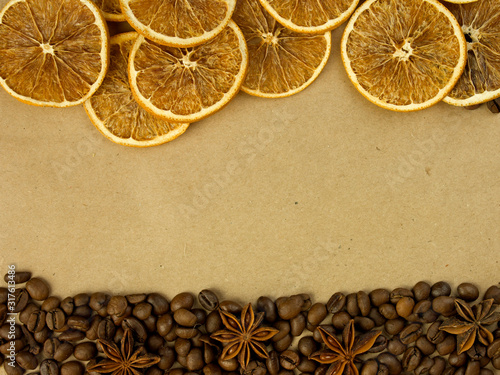coffee beans and spices lie on the background with place for text
