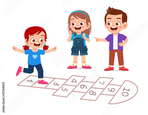 happy cute little kid boy and girl play hopscotch