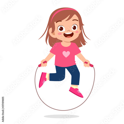 happy cute kid girl play jump rope